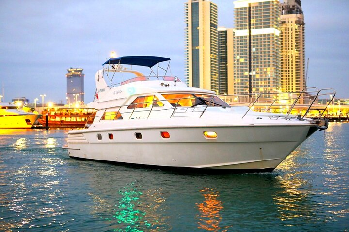 Sail through stunning city views on a luxurious 42 FT yacht perfect for unforgettable moments in Dubai's dazzling waters. Experience relaxation and leisure like never before.